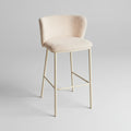 Angled view of Arven Bar Stool highlighting contoured wooden seat and slim cross-braced legs