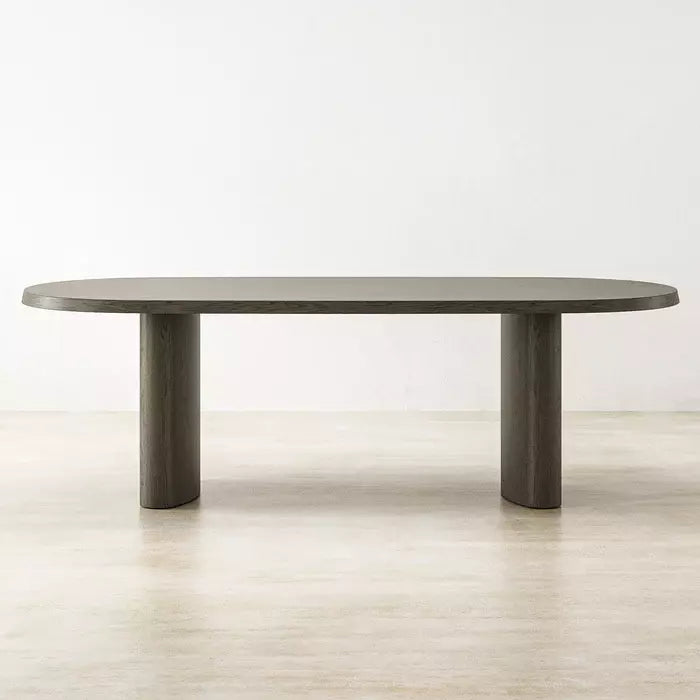 Straight-on view of Charcoal Zora Ideale Dining Table showcasing minimalist lines and solid wood construction