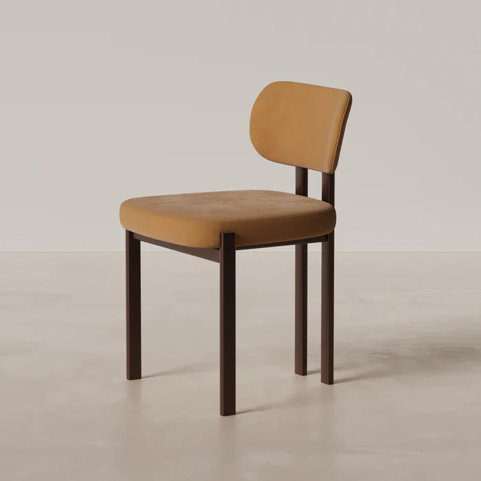 Side view of Coral Dining Chair with slim legs and ergonomic cushioned seating