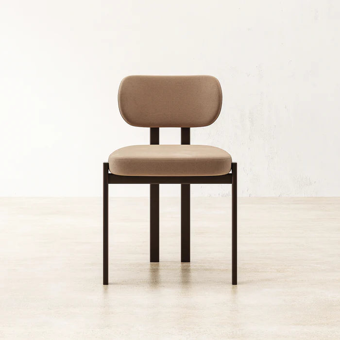 Straight-on image of Coral Dining Chair emphasizing modern design and compact structure