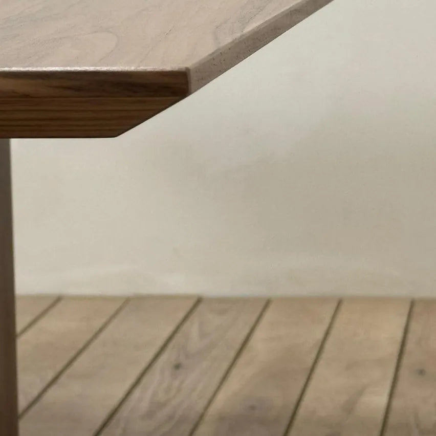 Detailed close-up of Divine Dining Table’s polished and clean edge finish