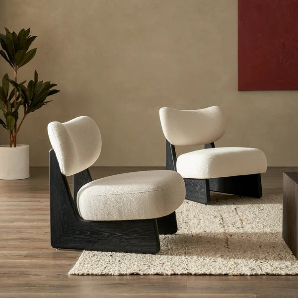 Eden Accent Chairs in a modern UAE living room featuring plush upholstery and softly curved silhouette