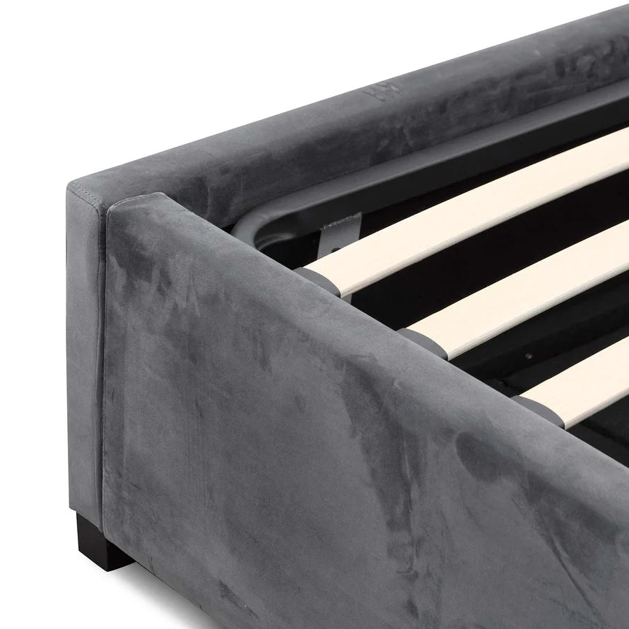Close-up of Elsa Bed’s base showcasing soft spec charcoal velvet and precise stitching