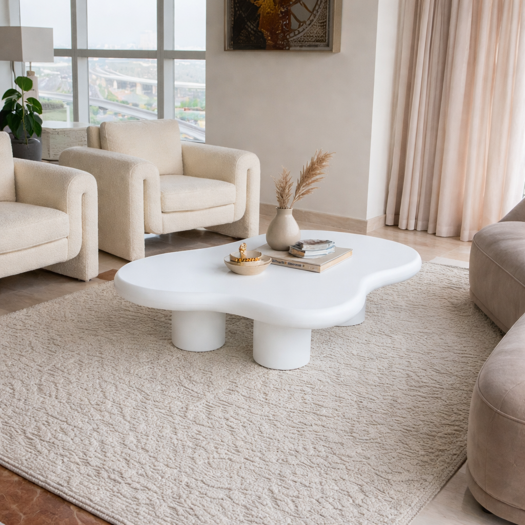 Modern living room with a white coffee table.