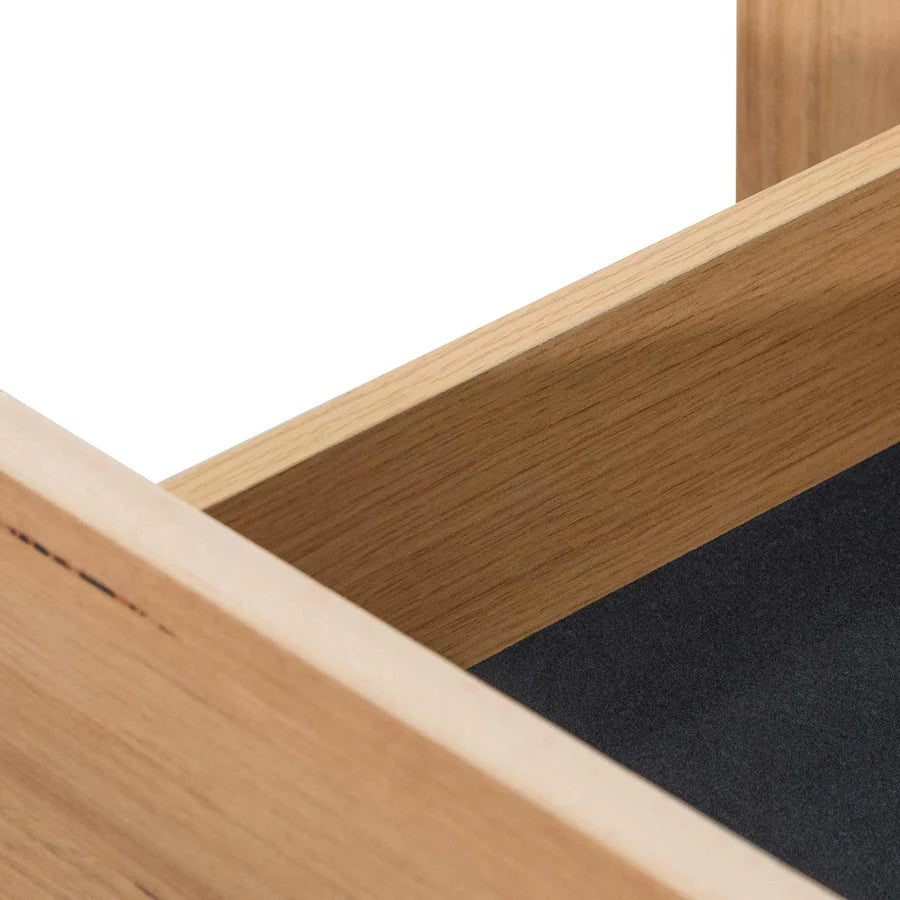 Detailed close-up of Fuegoleon Cabinet’s natural wood veneer and precision craftsmanship
