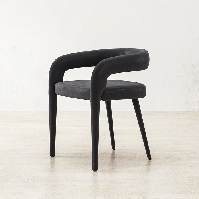 Side view of Charcoal Gladiator Dining Chair with slender legs and ergonomically padded seat