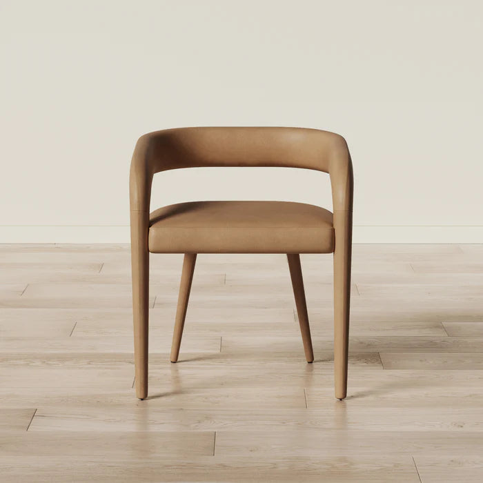 Straight-on image of Tan Gladiator Dining Chair emphasizing modern silhouette and bold structure