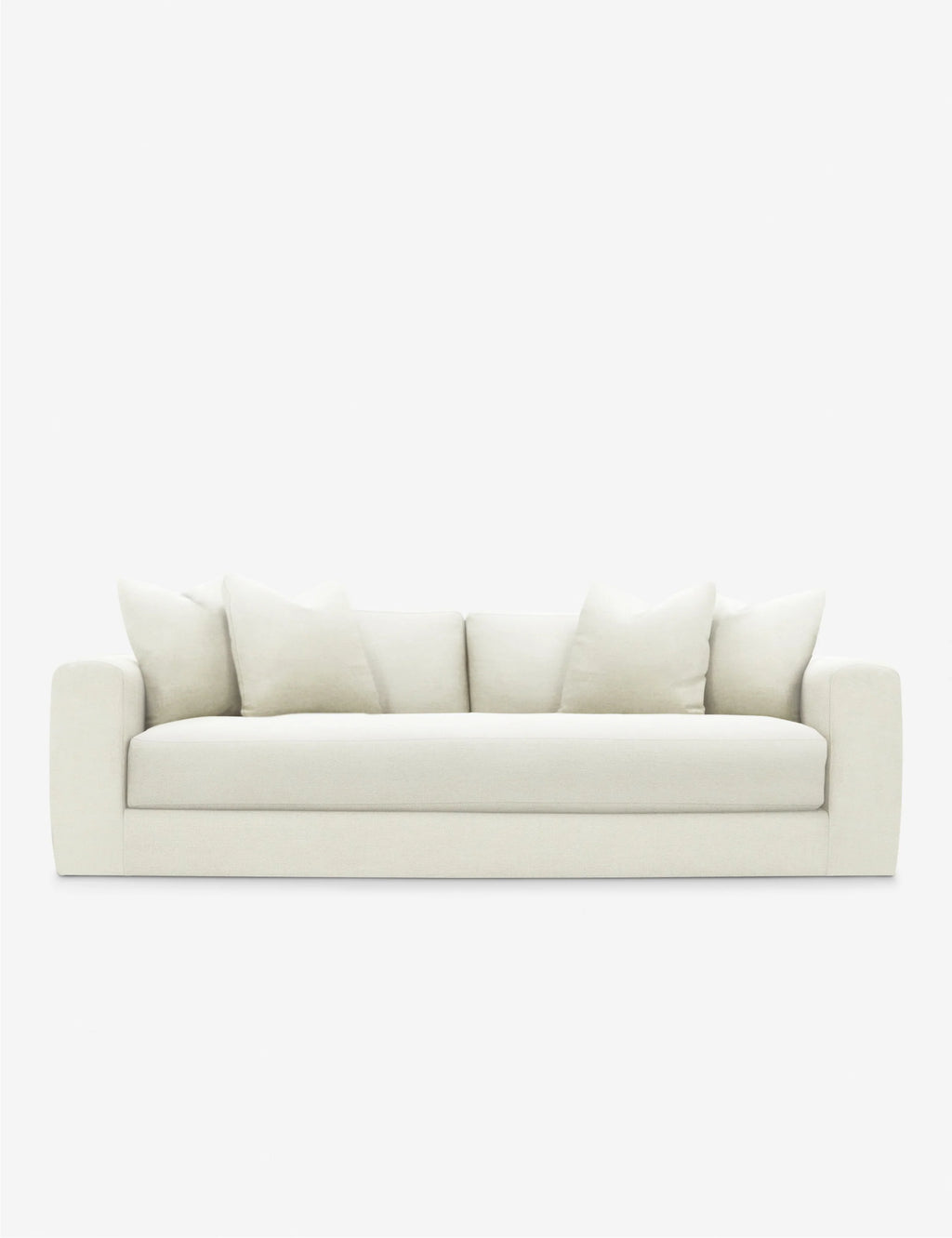 Front view of Natural Plain color Gunhee Sofa styled with earthy decor and layered textiles