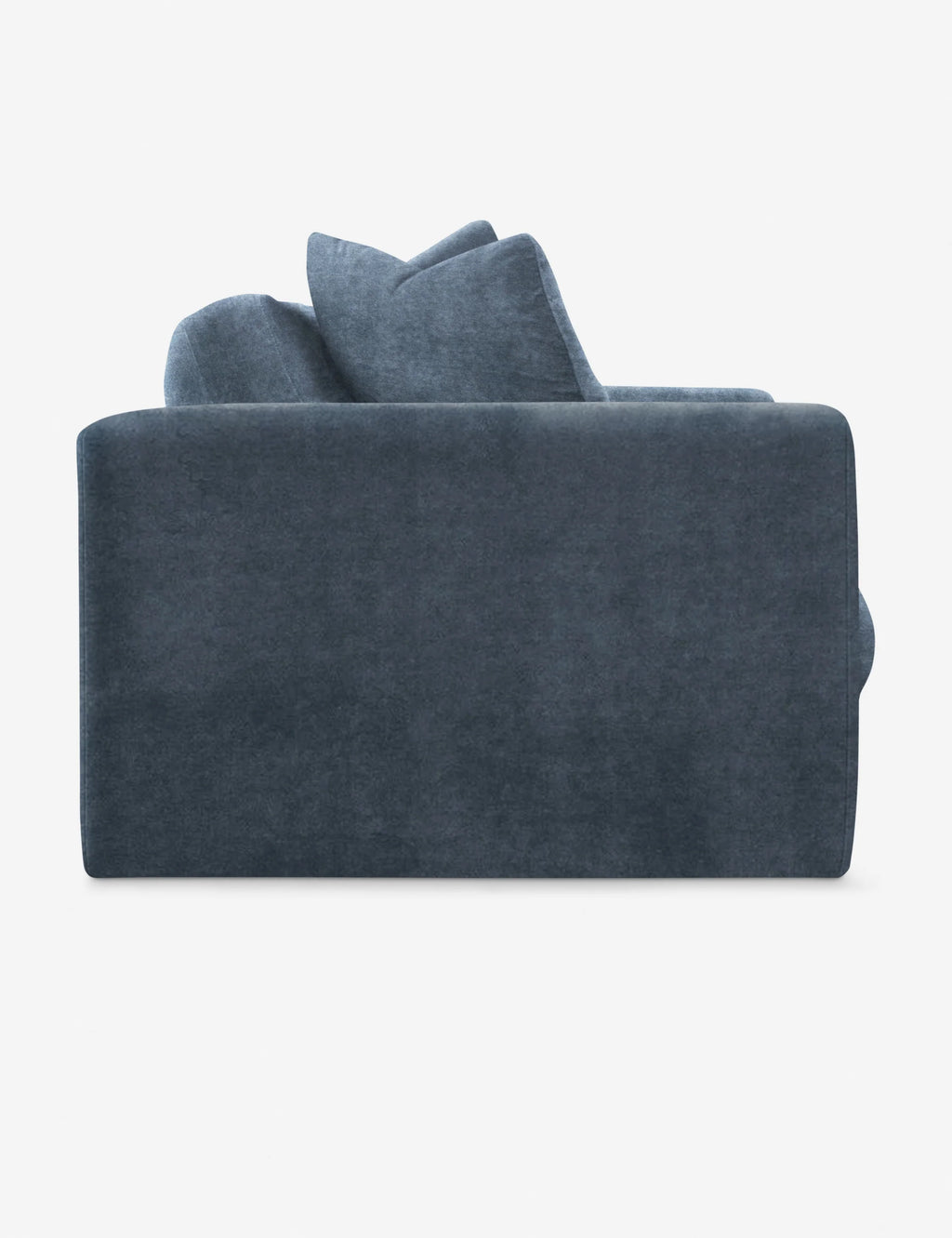 Side view of Gunhee Blue Sofa with deep cushions and wide arms, designed for spacious contemporary interiors