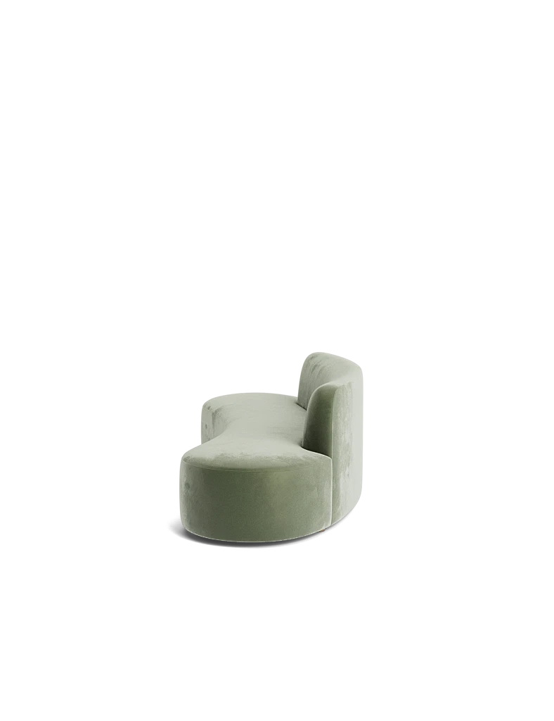 Angled perspective of the Haein Sofa highlighting its sculptural form and deep, cushioned seat