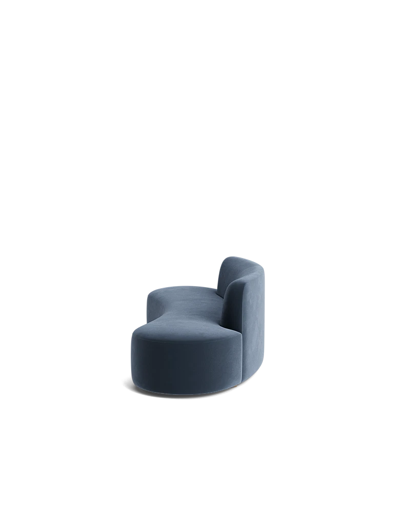 Side view of the Haein Sofa blue highlighting its sculptural form and deep, cushioned seat.