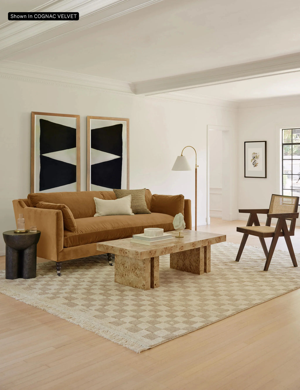 Hwan Sofa styled with a soft-toned rug and coffee table in a modern UAE apartment interior