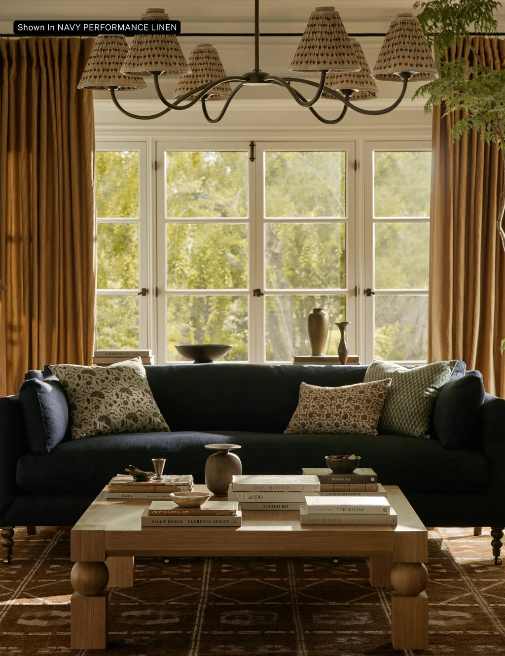 Hwan Sofa styled with a soft-toned rug and coffee table in a modern UAE apartment interior