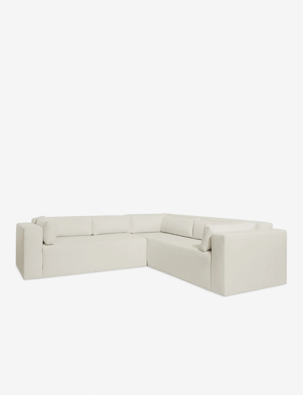 Overhead view of sectional corner showing pillow-back arrangement and durable fabric texture