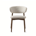 Louise modern dining chair in solid wood with curved backrest front fiew.
