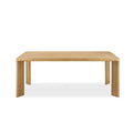 Straight-on image of Lunaro Dining Table emphasizing sculptural base and timeless wooden elegance