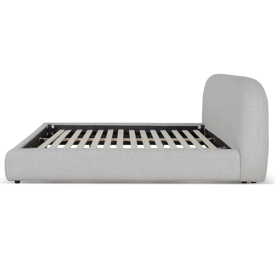 Side view of Merida Upholstered Bed with rounded edges