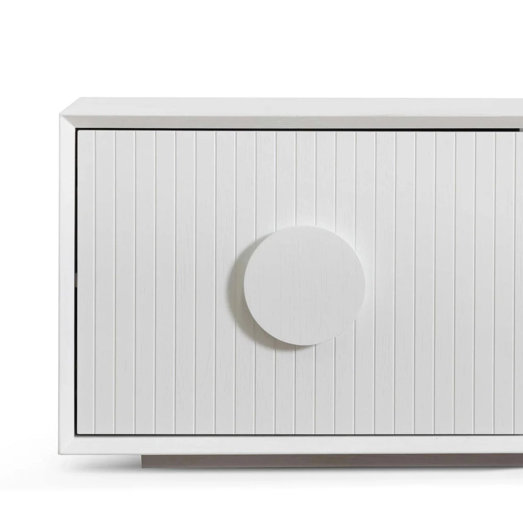 Detailed close-up of Mimosa Cabinet’s fluted wood panels and minimalistic circled handles