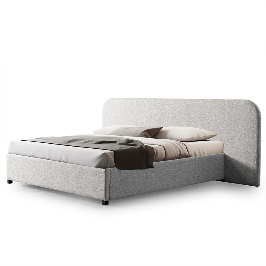 Rounded headboard and matte black wooden legs of Miso Bed