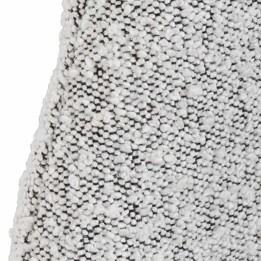 Detailed close-up of Miso Bed’s dusty pepper bouclé fabric