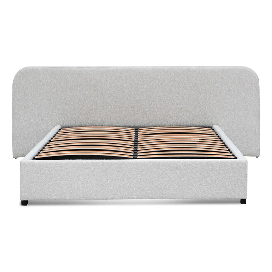 Straight-on image of Miso Bed emphasizing its sculpted headboard and contemporary low-profile design