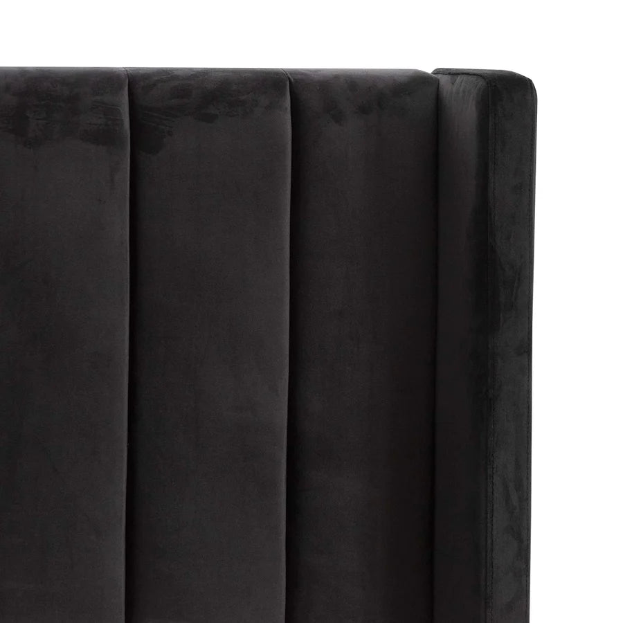 Detailed close-up of Mortimer Bed’s Black polyester upholstery and soft foam-cushioned headboard