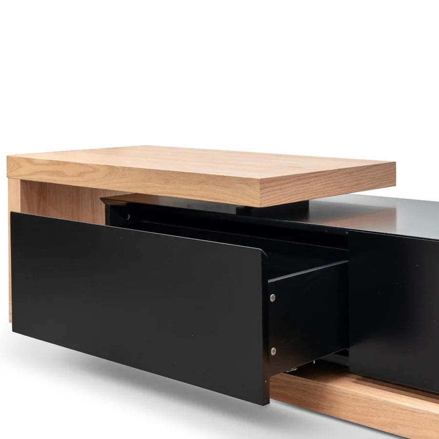 Detailed close-up of Natsuki TV Unit’s wood veneer finish with smooth black drawer detailing