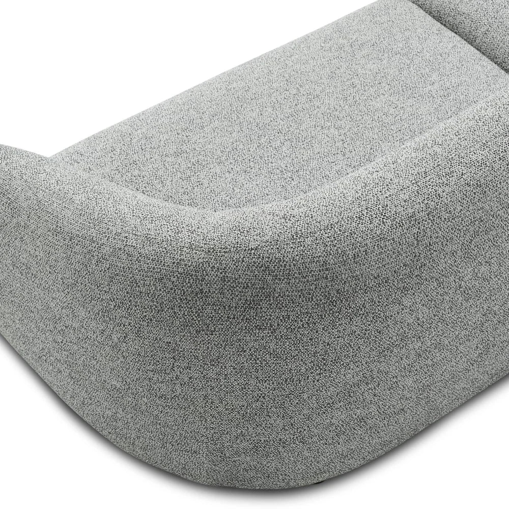 Detailed close-up of Novaro Sofa’s premium gray fabric upholstery and neat seam craftsmanship