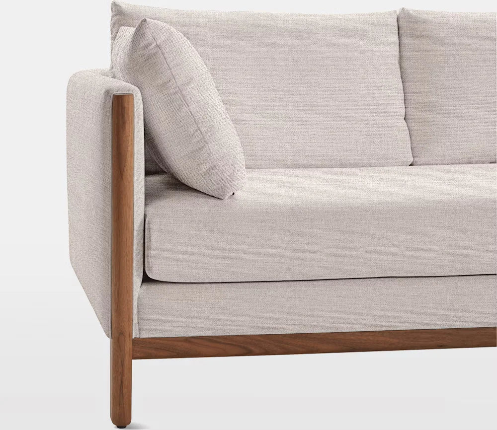 close-up of Serano Sofa’s smooth fabric upholstery and precise stitching lines