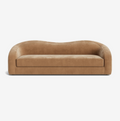 Shigeo Curved Modern Sofa with soft neutral tones and curved silhouette