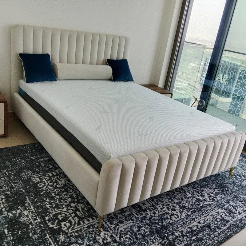 Sigurd Upholstered Bed in a serene UAE bedroom, featuring vertical panel headboard and soft neutral tones
