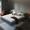 Strea Upholstered Bed in a contemporary UAE bedroom with soft lighting and cozy neutral tones