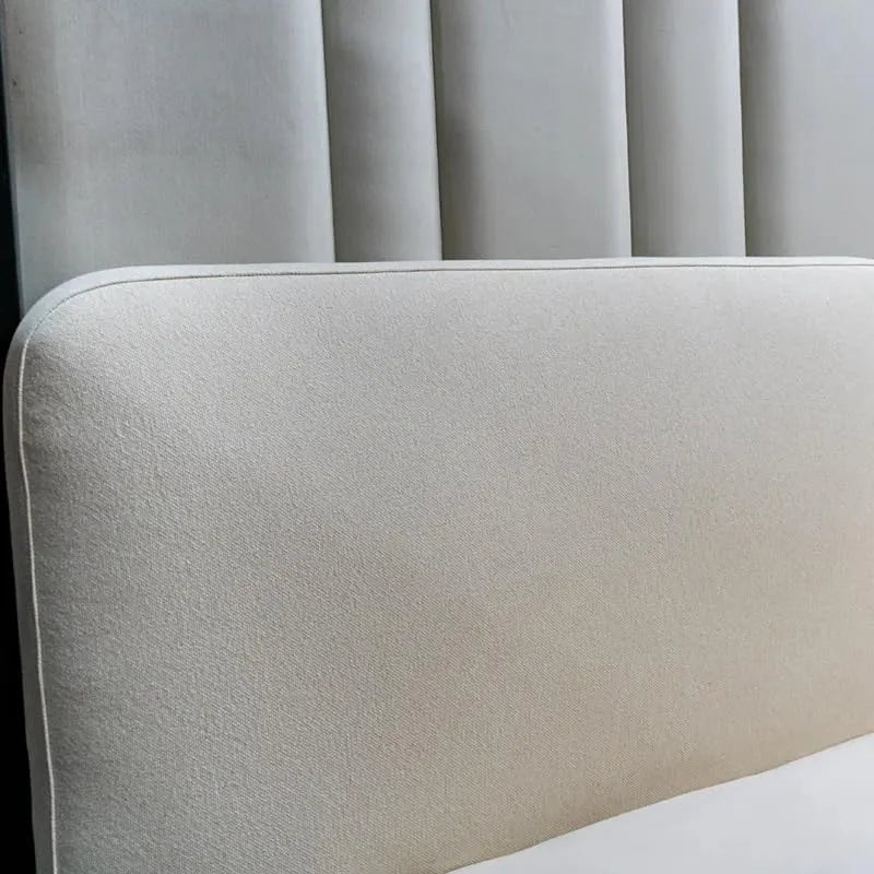 Detailed close-up of the Sugou Bed’s soft fabric finish 