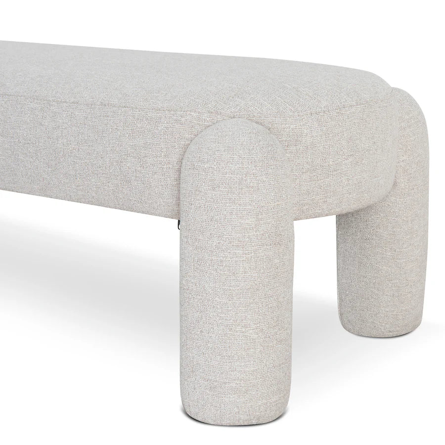 Amayori Upholstered Dining Bench in Coastal Beige fabric – angled  close leg side shot showcasing smooth upholstery and leg detail