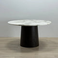 Straight-on view of Yami Sukehiro Dining Table highlighting minimalist lines and bold leg design