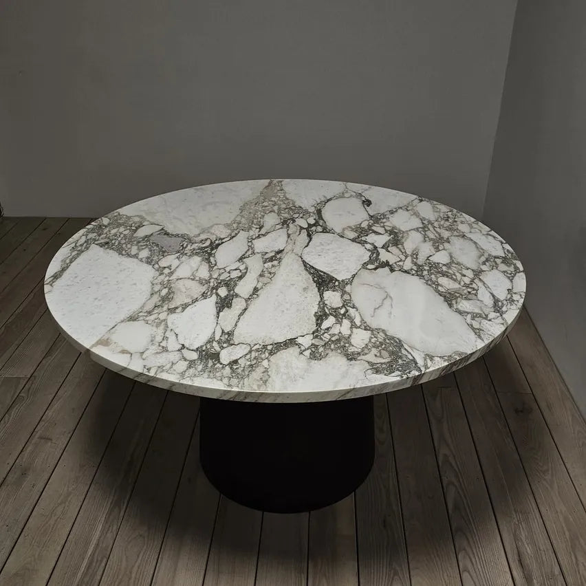 Top-down image of Yami Sukehiro Dining Table set for six in a contemporary dining space