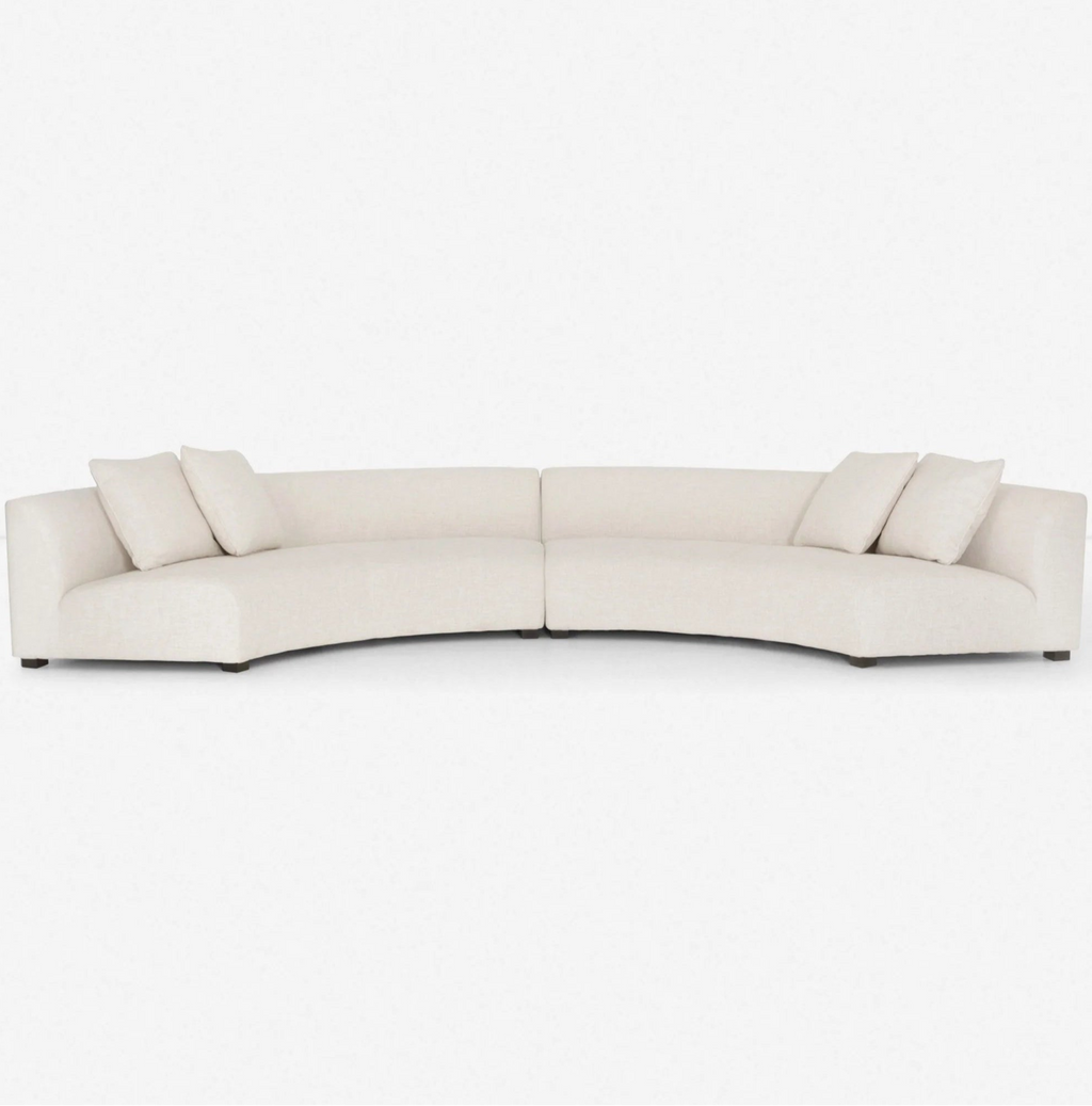 Yerim Curved Sectional Sofa in ivory fabric.