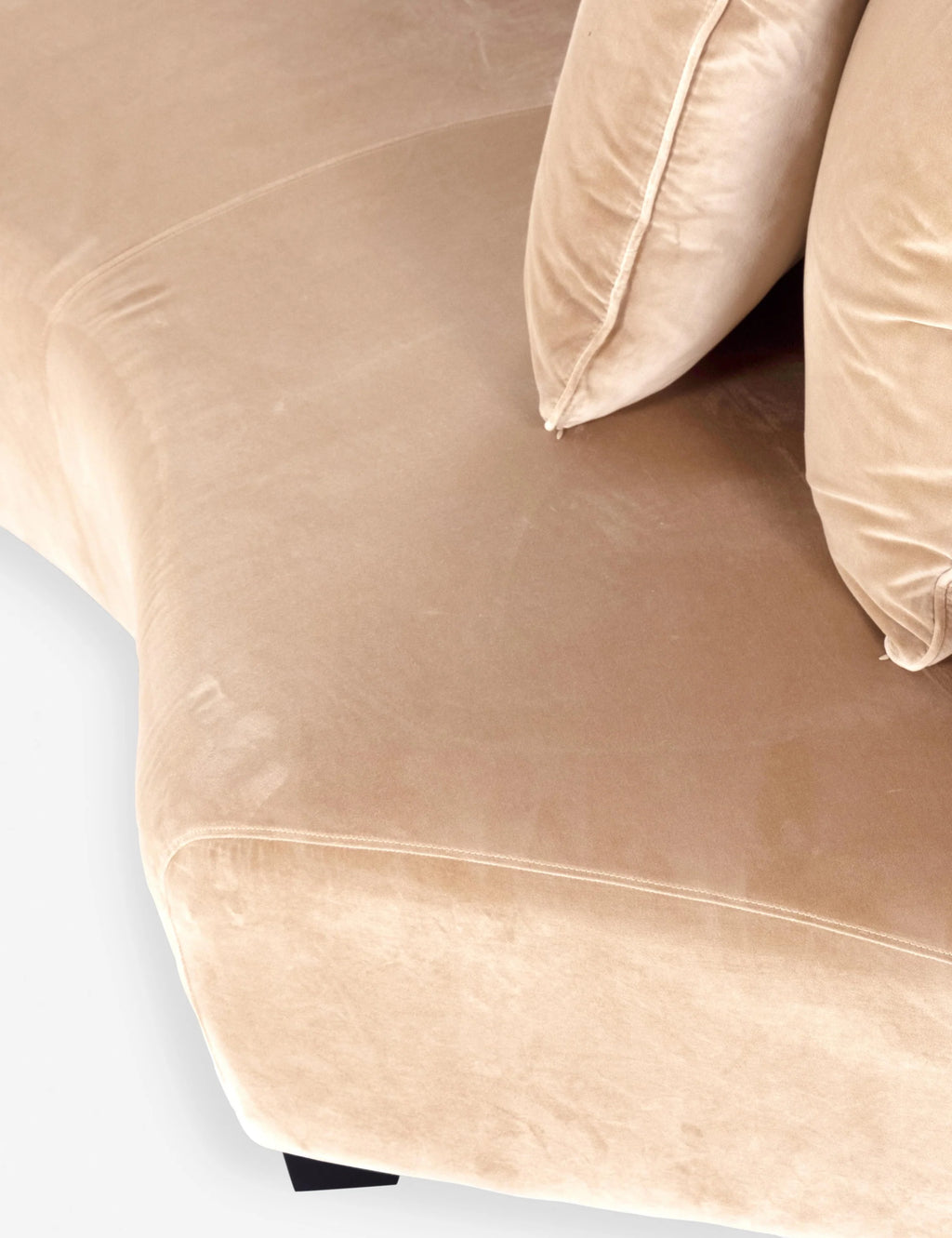 Detailed fabric texture and smooth curvature of the Yerim Sofa in camel velvet finish