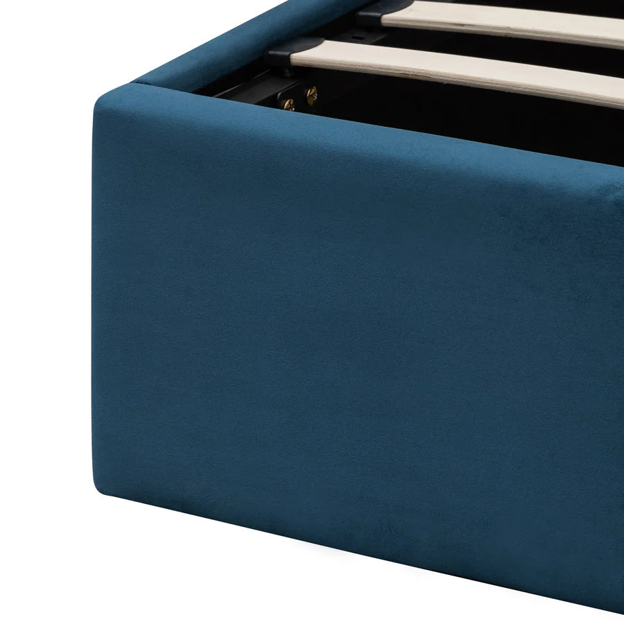 Detailed close-up of Yuuki Bed’s base with rich navy velvet fabric 