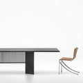 Ace rectangular dining table with slatted architectural black oak base and minimalist chair