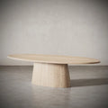 Langris oval dining table with natural oak veneer top and sculptural pedestal base