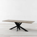 Magna dining table in light grey wood finish with black wooden X-base