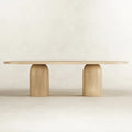 Zenon oval dining table in natural finish with sculptural dual-pillar base