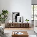Luka TV Unit front view with oak slatted sliding doors in living room setup