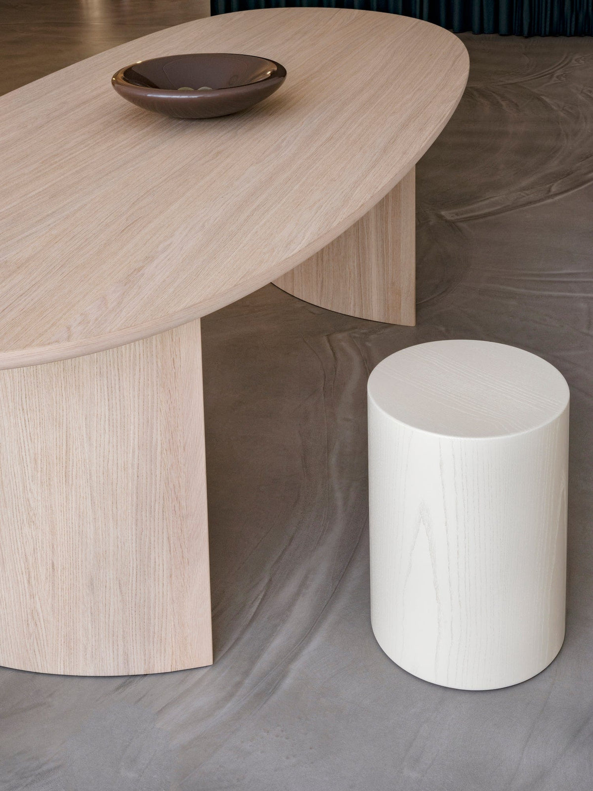 Side top profile of Dew Dining Table showing matte oak finish